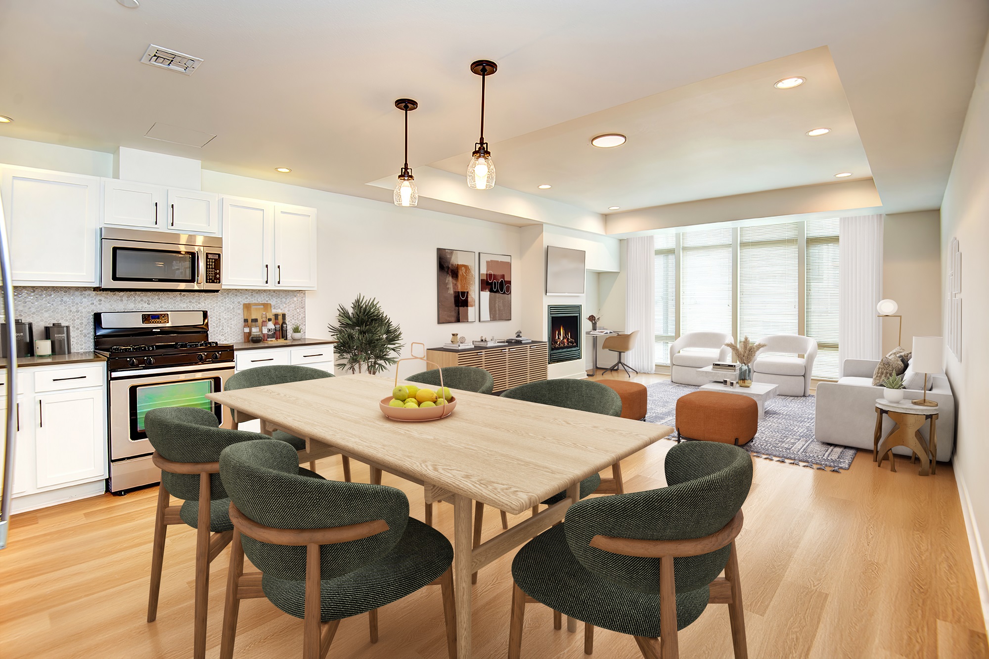 Open-concept dining area and kitchen at Hanna Heights Tacoma apartments