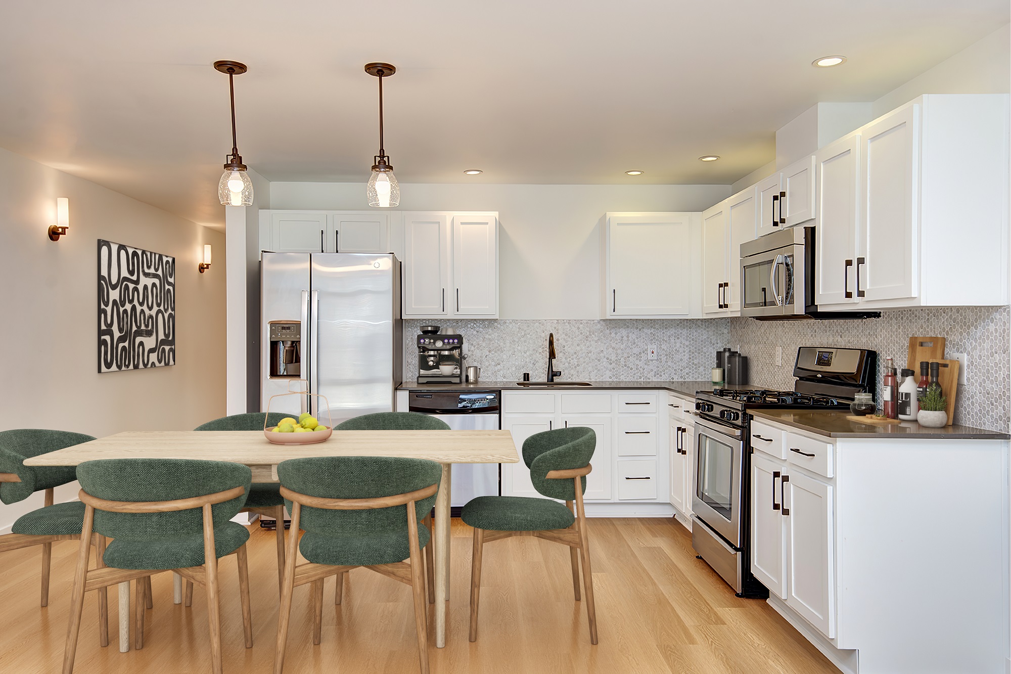 Luxury kitchen with stainless steel appliances at Hanna Heights apartments in Tacoma, WA